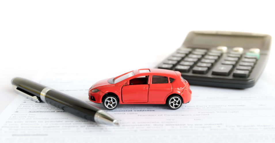 Car, Pen, Calculator on Paper
